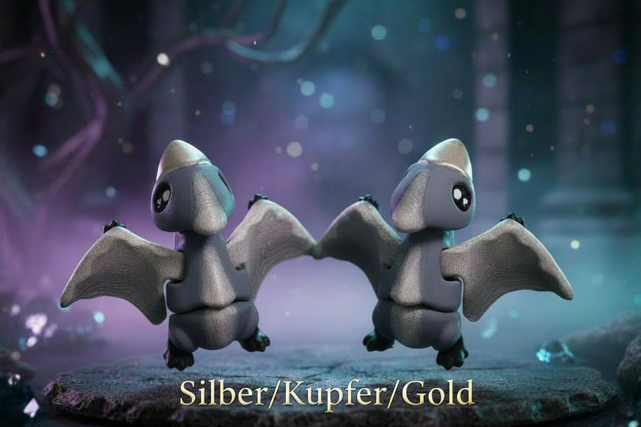 Pterodaktylus-Keychain, silberner Dino mit kupfer- und goldfarbenen Details