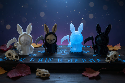 Hasenfiguren im Stricklook, 3D, leuchtend in blau und weiß