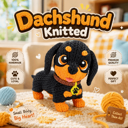 Gestrickte Dackel-Figurine in Schwarz mit orangefarbenem Bauch, handgearbeitet wirkend